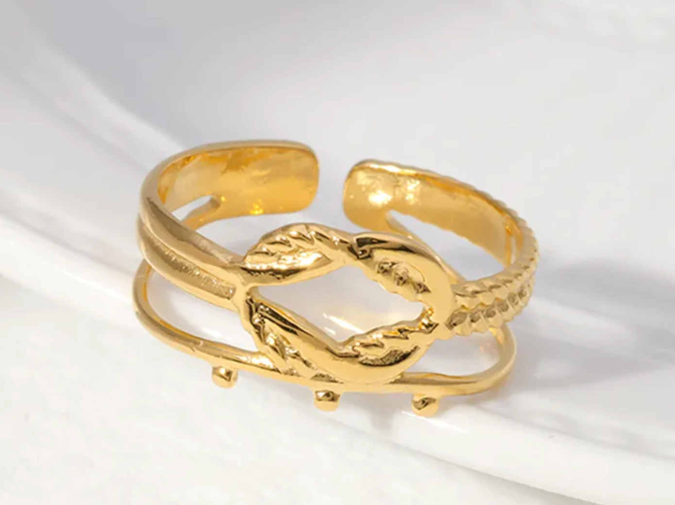 SORTIJA AJUSTABLE EN STAINLESS STEEL DISEÑO DE NUDO