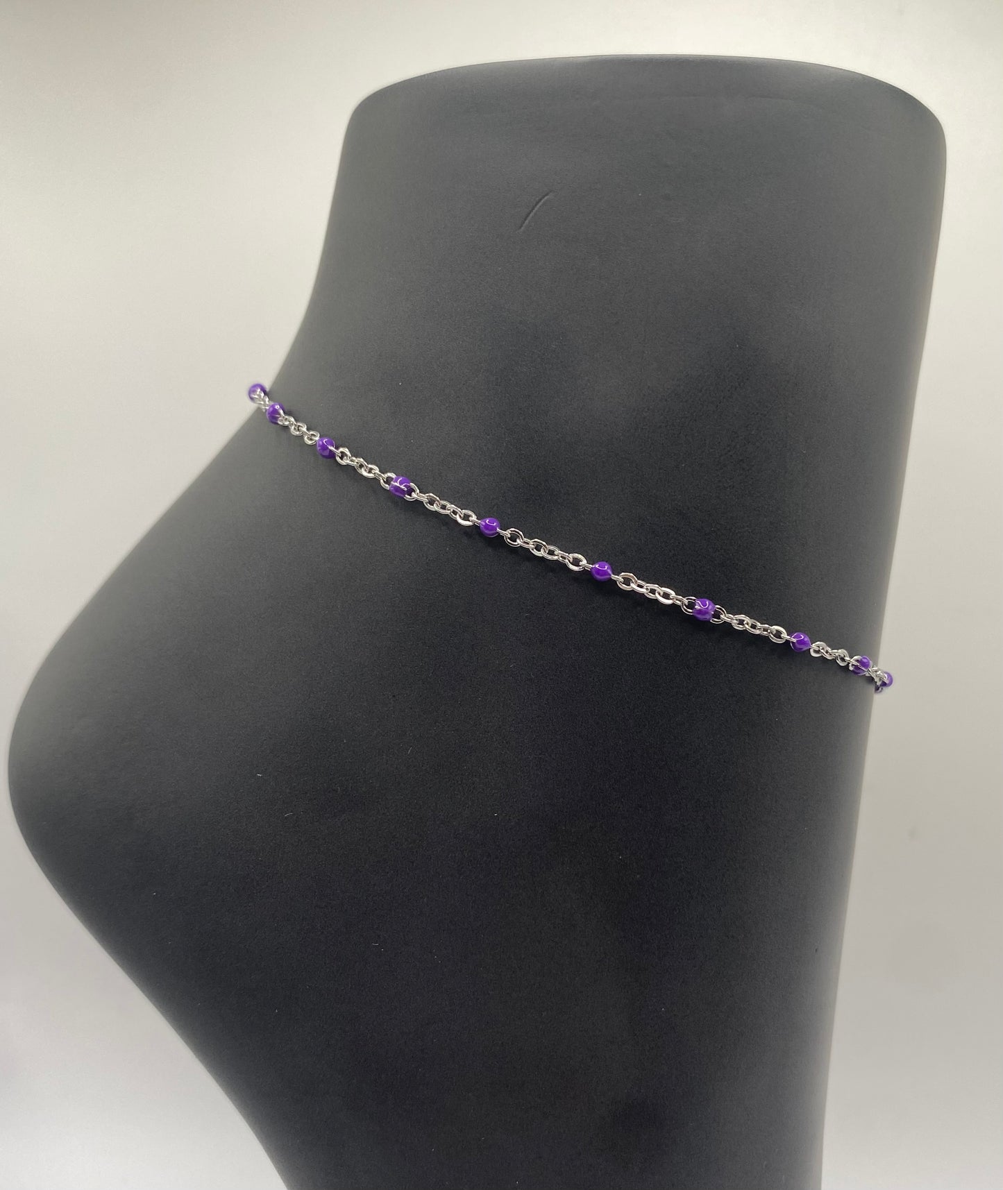 TOBILLERA EN STAINLESS STEEL PLATEADO DE 10" CON CUENCAS