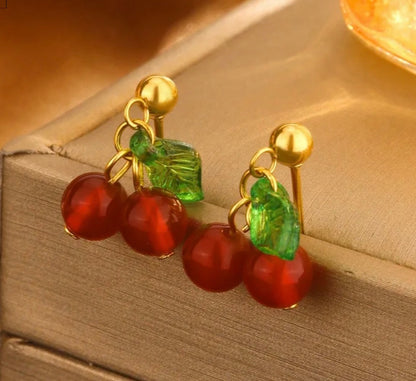 SET DE COLLAR Y PANTALLAS EN STAINLESS STEEL DORADO CON COLGANTE DE SWEET CHERRY